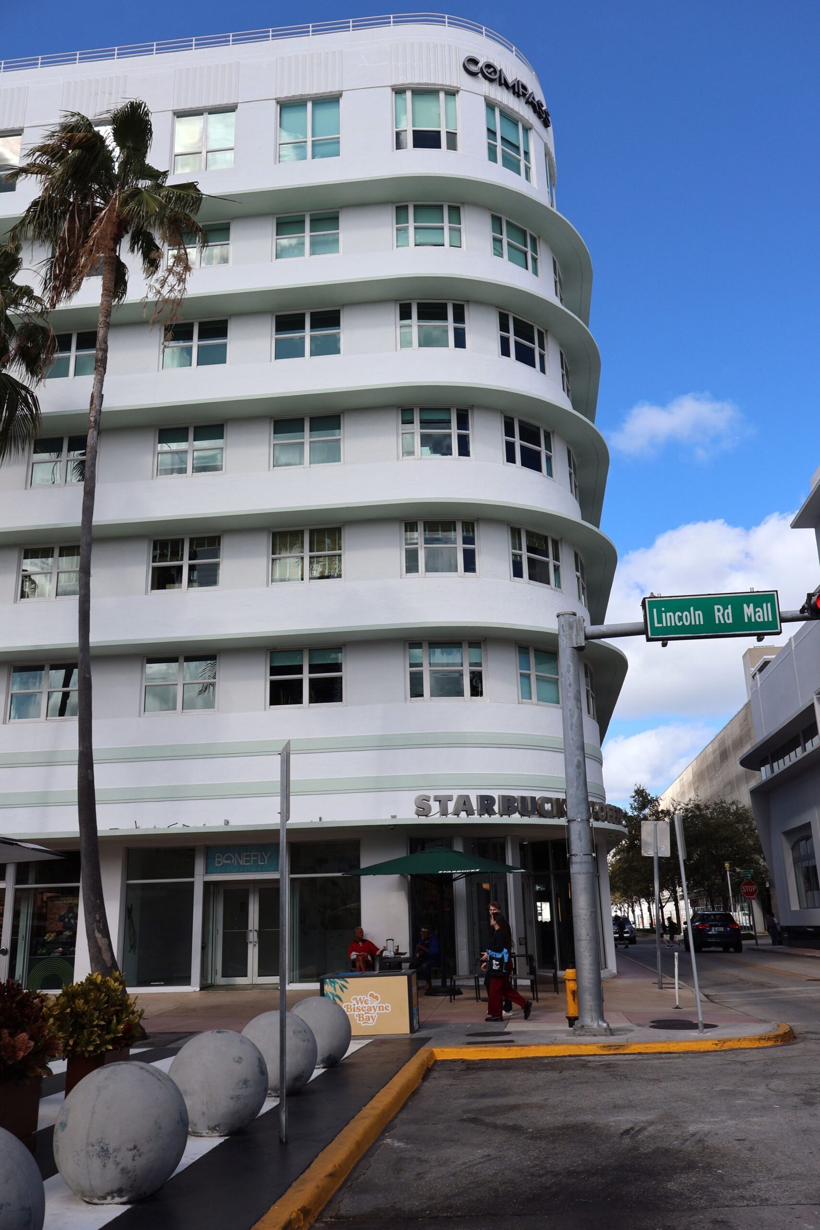 Miami Mixed-Use Property Management: What Urban Owners Need to Coordinate Art Deco architecture on Lincoln Road in Miami Beach with Starbucks storefront.